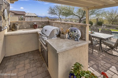 This ideally located and beautiful home is comprised of on Saddlebrooke Ranch Golf Club in Arizona - for sale on GolfHomes.com, golf home, golf lot