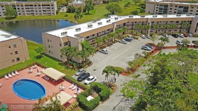 Enjoy spacious, open-concept living with stunning views in this on Sunrise Lakes Phase IV Golf Course in Florida - for sale on GolfHomes.com, golf home, golf lot