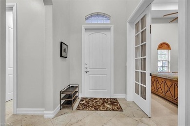 Welcome home to this elegant and well-maintained Stock Tivoli on The Classics Country Club At Lely Resort in Florida - for sale on GolfHomes.com, golf home, golf lot