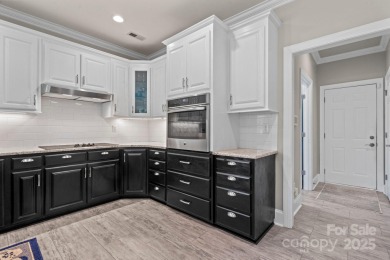 Welcome to this beautifully remodeled 1-story basement home on Verdict Ridge Golf and Country Club in North Carolina - for sale on GolfHomes.com, golf home, golf lot