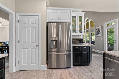 Welcome to this beautifully remodeled 1-story basement home on Verdict Ridge Golf and Country Club in North Carolina - for sale on GolfHomes.com, golf home, golf lot