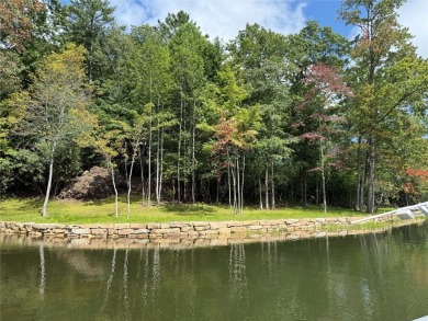 Two adjoining lake front lots on beautiful Lake Toxaway on Lake Toxaway Country Club in North Carolina - for sale on GolfHomes.com, golf home, golf lot