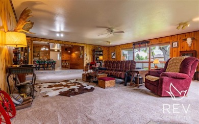 Beautiful five bedroom (could be seven), three bath home on a 15 on Olive Glenn Golf and Country Club in Wyoming - for sale on GolfHomes.com, golf home, golf lot