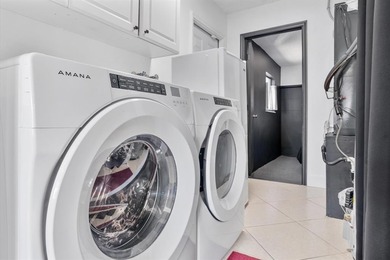 Welcome to this cozy single-family home in Sunrise Golf Village on Sunrise Lakes Phase III in Florida - for sale on GolfHomes.com, golf home, golf lot