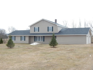 This 4 bedroom, 2 and 1/2 bath colonial is in a small village on  in Vermont - for sale on GolfHomes.com, golf home, golf lot