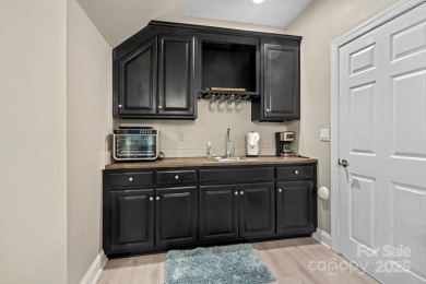 Welcome to this beautifully remodeled 1-story basement home on Verdict Ridge Golf and Country Club in North Carolina - for sale on GolfHomes.com, golf home, golf lot
