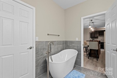 Welcome to this beautifully remodeled 1-story basement home on Verdict Ridge Golf and Country Club in North Carolina - for sale on GolfHomes.com, golf home, golf lot