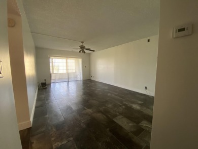 Step into this spacious condo, ideally situated on the 3rd floor on Boca Dunes Golf and Country Club in Florida - for sale on GolfHomes.com, golf home, golf lot