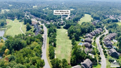 Welcome to this beautifully remodeled 1-story basement home on Verdict Ridge Golf and Country Club in North Carolina - for sale on GolfHomes.com, golf home, golf lot