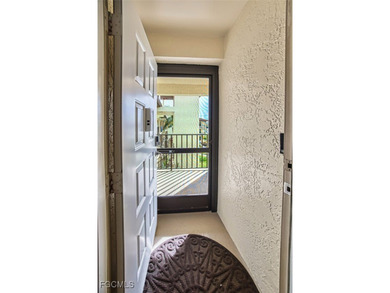 Turnkey, top-floor condo ideal for seasonal living or rental on Kelly Greens Golf and Country Club in Florida - for sale on GolfHomes.com, golf home, golf lot