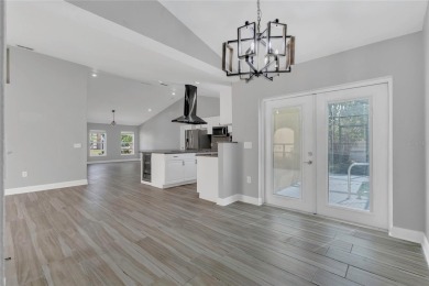 Renovated and stunning 4-bedroom, 2-bath pool home offers the on Royal St. Cloud Golf Links in Florida - for sale on GolfHomes.com, golf home, golf lot