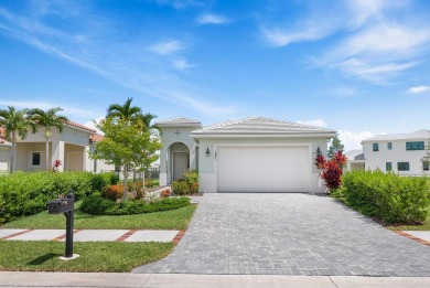 Stunning lakefront home in the gorgeous gated golf community of on The Tesoro Golf Course and Club in Florida - for sale on GolfHomes.com, golf home, golf lot