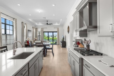 Stunning lakefront home in the gorgeous gated golf community of on The Tesoro Golf Course and Club in Florida - for sale on GolfHomes.com, golf home, golf lot
