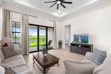 Stunning lakefront home in the gorgeous gated golf community of on The Tesoro Golf Course and Club in Florida - for sale on GolfHomes.com, golf home, golf lot