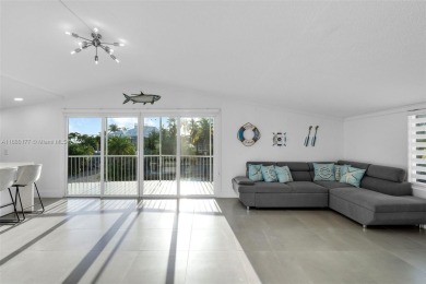 Welcome to this beautifully elevated 2-bedroom, 2-bathroom on  in Florida - for sale on GolfHomes.com, golf home, golf lot