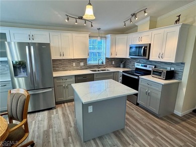 Welcome to Palmetto Palms where YOU own the land. This cozy 2 on Kelly Greens Golf and Country Club in Florida - for sale on GolfHomes.com, golf home, golf lot