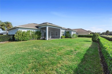 This beautifully landscaped and meticulously kept Black Bear on Black Bear Golf Club in Florida - for sale on GolfHomes.com, golf home, golf lot