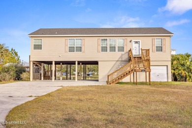 Welcome to your perfect waterfront retreat! This 3-bedroom on The Bridges Golf Club At Hollywood Casino in Mississippi - for sale on GolfHomes.com, golf home, golf lot