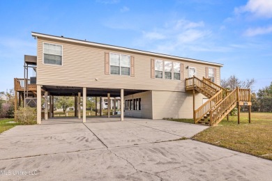 Welcome to your perfect waterfront retreat! This 3-bedroom on The Bridges Golf Club At Hollywood Casino in Mississippi - for sale on GolfHomes.com, golf home, golf lot