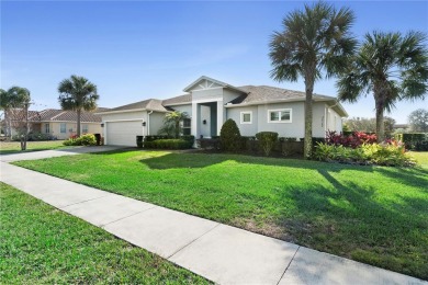 This beautifully landscaped and meticulously kept Black Bear on Black Bear Golf Club in Florida - for sale on GolfHomes.com, golf home, golf lot