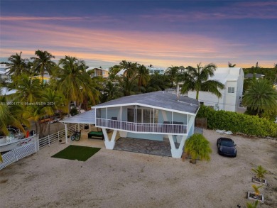 Welcome to this beautifully elevated 2-bedroom, 2-bathroom on  in Florida - for sale on GolfHomes.com, golf home, golf lot