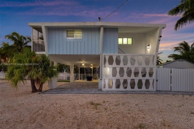 Welcome to this beautifully elevated 2-bedroom, 2-bathroom on  in Florida - for sale on GolfHomes.com, golf home, golf lot