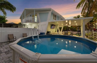 Welcome to this beautifully elevated 2-bedroom, 2-bathroom on  in Florida - for sale on GolfHomes.com, golf home, golf lot