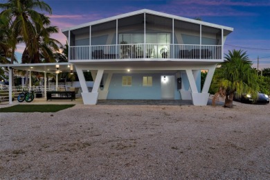 Welcome to this beautifully elevated 2-bedroom, 2-bathroom on  in Florida - for sale on GolfHomes.com, golf home, golf lot