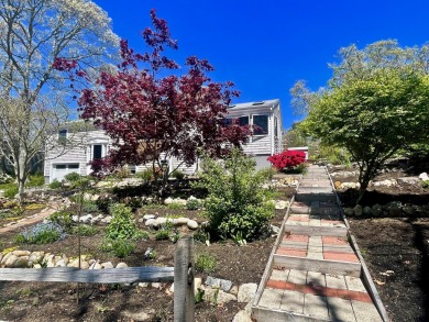 Set in a quiet neighborhood, just over a mile from so much of on Cranberry Valley Golf Course in Massachusetts - for sale on GolfHomes.com, golf home, golf lot