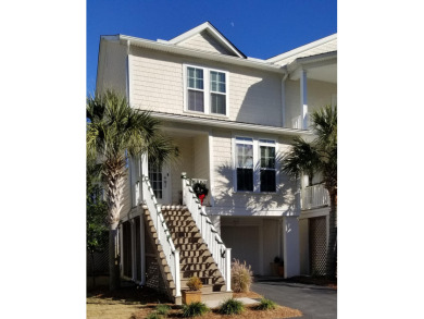 This beautiful end unit with an elevator is the one to show your on Charleston National Golf Club in South Carolina - for sale on GolfHomes.com, golf home, golf lot
