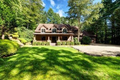 This stunning home sits on a private 2.45 ac. lot with lots of on Lake Toxaway Country Club in North Carolina - for sale on GolfHomes.com, golf home, golf lot