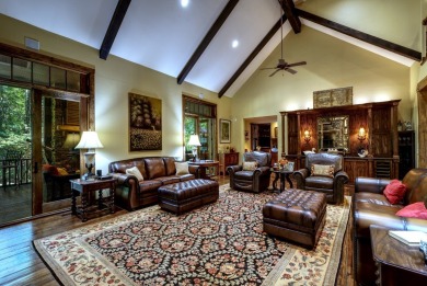 This stunning home sits on a private 2.45 ac. lot with lots of on Lake Toxaway Country Club in North Carolina - for sale on GolfHomes.com, golf home, golf lot