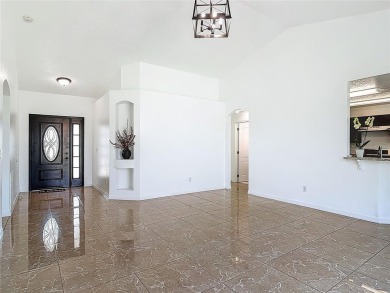 Under contract-accepting backup offers. One or more photo(s) has on Wedgefield Golf Club in Florida - for sale on GolfHomes.com, golf home, golf lot