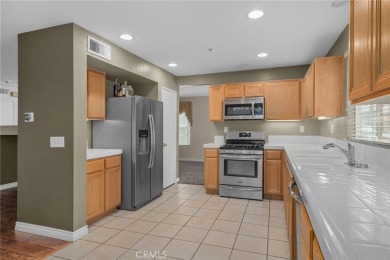 Looking for a beautiful home in the sought after community of on Sierra Lakes Golf Club in California - for sale on GolfHomes.com, golf home, golf lot