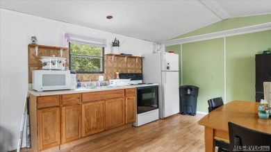 Discover the perfect opportunity to enjoy lake life at an on River Ridge Golf Club in Virginia - for sale on GolfHomes.com, golf home, golf lot