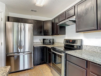 Under contract-accepting backup offers. One or more photo(s) has on Wedgefield Golf Club in Florida - for sale on GolfHomes.com, golf home, golf lot