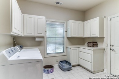 Nestled on the picturesque golf course at Tapatio Springs, this on Tapatio Springs Country Club and Resort in Texas - for sale on GolfHomes.com, golf home, golf lot