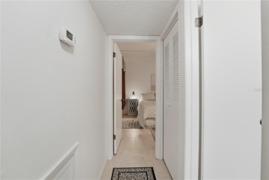 Behind the gates of Ventura Country Club, this first-floor on Ventura Country Club in Florida - for sale on GolfHomes.com, golf home, golf lot