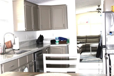 Step into this immaculately maintained and tastefully updated on Schalamar Creek Golf and Country Club in Florida - for sale on GolfHomes.com, golf home, golf lot