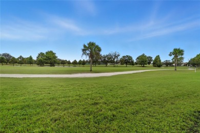 Behind the gates of Ventura Country Club, this first-floor on Ventura Country Club in Florida - for sale on GolfHomes.com, golf home, golf lot