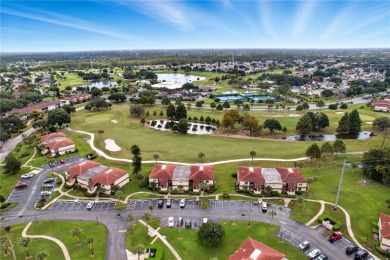 Behind the gates of Ventura Country Club, this first-floor on Ventura Country Club in Florida - for sale on GolfHomes.com, golf home, golf lot