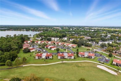 Behind the gates of Ventura Country Club, this first-floor on Ventura Country Club in Florida - for sale on GolfHomes.com, golf home, golf lot