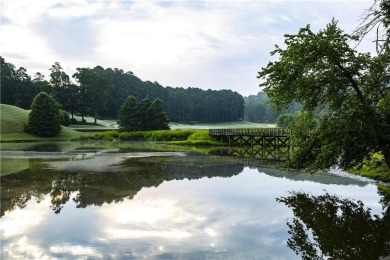 This 1.34 +/- acre lot overlooks the fourth fairway, offering on Hawks Ridge Golf Club in Georgia - for sale on GolfHomes.com, golf home, golf lot