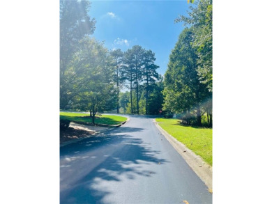 This 1.34 +/- acre lot overlooks the fourth fairway, offering on Hawks Ridge Golf Club in Georgia - for sale on GolfHomes.com, golf home, golf lot