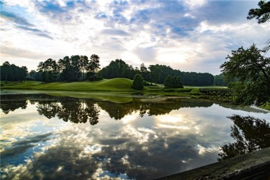 This 1.34 +/- acre lot overlooks the fourth fairway, offering on Hawks Ridge Golf Club in Georgia - for sale on GolfHomes.com, golf home, golf lot