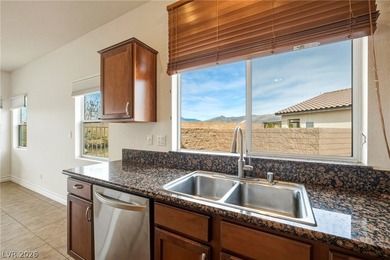 Experience suburban serenity just an hour away from Las Vegas on Mountain Falls Golf Course in Nevada - for sale on GolfHomes.com, golf home, golf lot