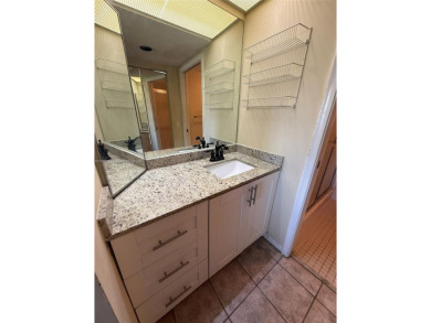 Welcome home to this stunning 2-bedroom, 2-bathroom FIRST FLOOR on Flamingo Lakes Country Club in Florida - for sale on GolfHomes.com, golf home, golf lot