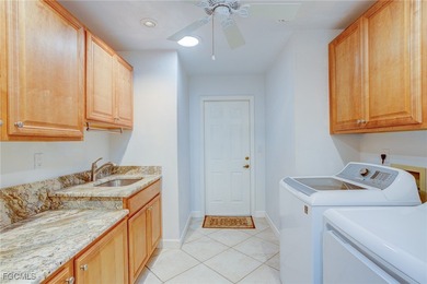 Experience the best of Southwest Florida living in this on Eagle Ridge Golf and Tennis Club in Florida - for sale on GolfHomes.com, golf home, golf lot