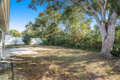 One or more photo(s) has been virtually staged. Sprawling, 3-bed on Oak Hills Country Club in Florida - for sale on GolfHomes.com, golf home, golf lot