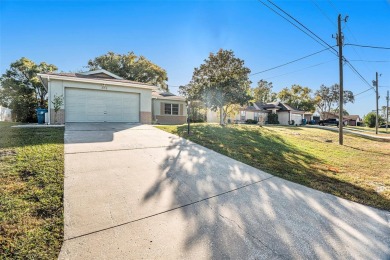 One or more photo(s) has been virtually staged. Sprawling, 3-bed on Oak Hills Country Club in Florida - for sale on GolfHomes.com, golf home, golf lot